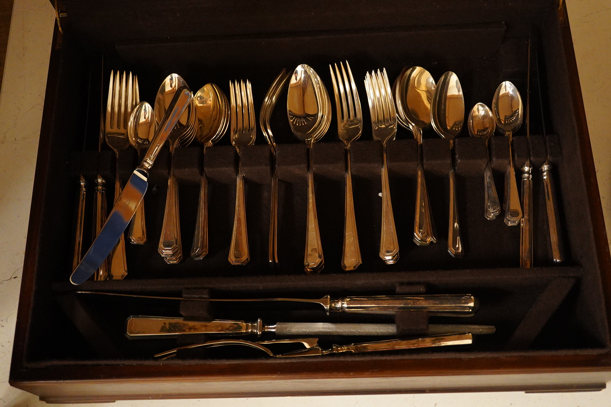 A cased EPNS canteen of cutlery, with a Harrods label. Condition - good